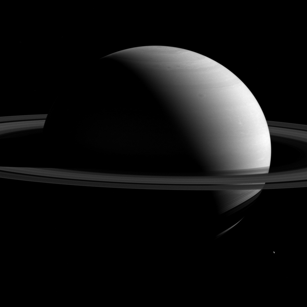 Giant Saturn Dwarfs Tiny Moon Tethys in Jaw-dropping NASA Photo
